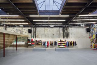 Inside of Supreme store with wooden skate ramp