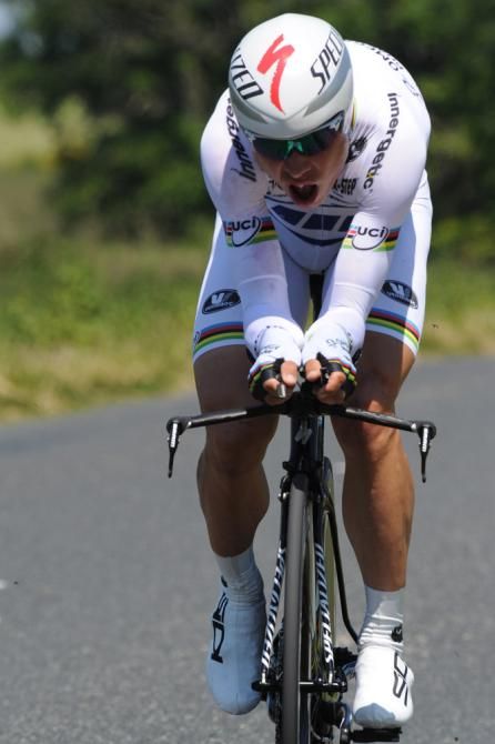 Tony Martin (Omega Pharma-QuickStep) powers to victory in the 32.5km time trial at the Dauphin&eacute;