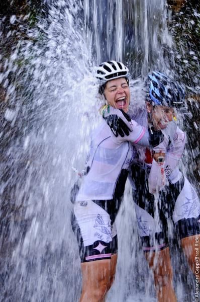 Now that feels good: riders enjoy a cooling shower.