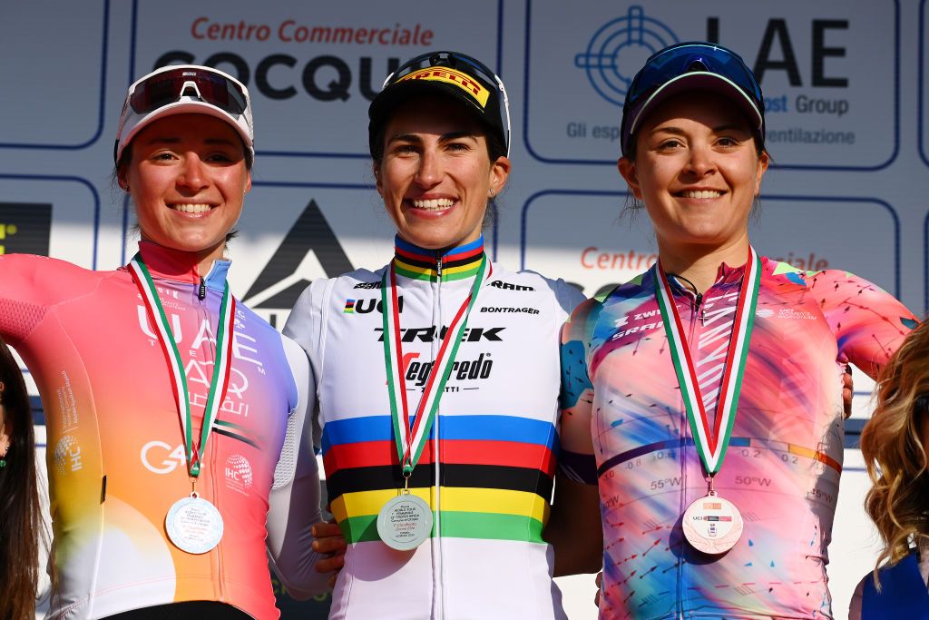 CITTIGLIO ITALY MARCH 20 LR Sofia Bertizzolo of Italy and UAE Team ADQ on second place race winner Elisa Balsamo of Italy and Team Trek Segafredo and Soraya Paladin of Italy and Team Canyon SRAM Racing on third place pose on the podium during the podium ceremony after the 46th Trofeo Alfredo BindaComune di Cittiglio 2021 Womens Elite a 1418km one day race from Cocquio Trevisago to Cittiglio TrBinda UCIWWT on March 20 2022 in Cittiglio Italy Photo by Tim de WaeleGetty Images