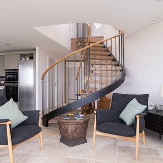 Industrial spiral staircase in living room made by Bisca