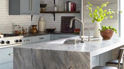 Light kitchen with marble island