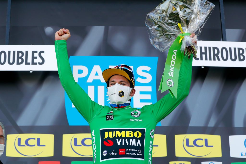 CHIROUBLES FRANCE MARCH 10 Podium Primoz Roglic of Slovenia and Team Jumbo Visma Green sprint jersey Celebration during the 79th Paris Nice 2021 Stage 4 a 1875km stage from ChalonSurSane to Chiroubles 702m Mask Covid safety measures Trophy Flowers ParisNice on March 10 2021 in Chiroubles France Photo by Bas CzerwinskiGetty Images