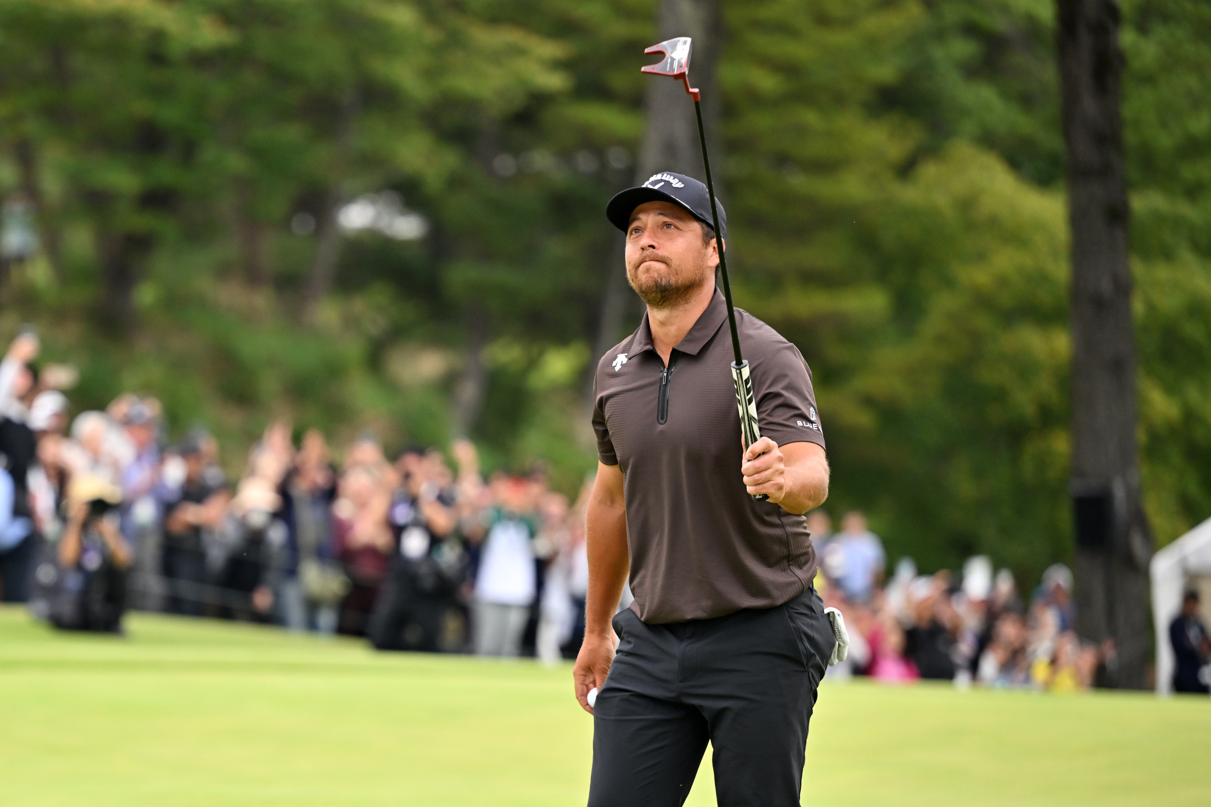 Xander Schauffele holds his putter aloft at the Baycurrent Classic en route to victory in Japan