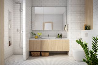 a bright bathroom with metro tiles on the walls