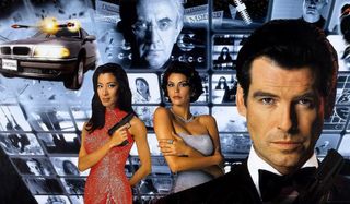 Tomorrow Never Dies Bond and his co-stars in front of a wall of monitors