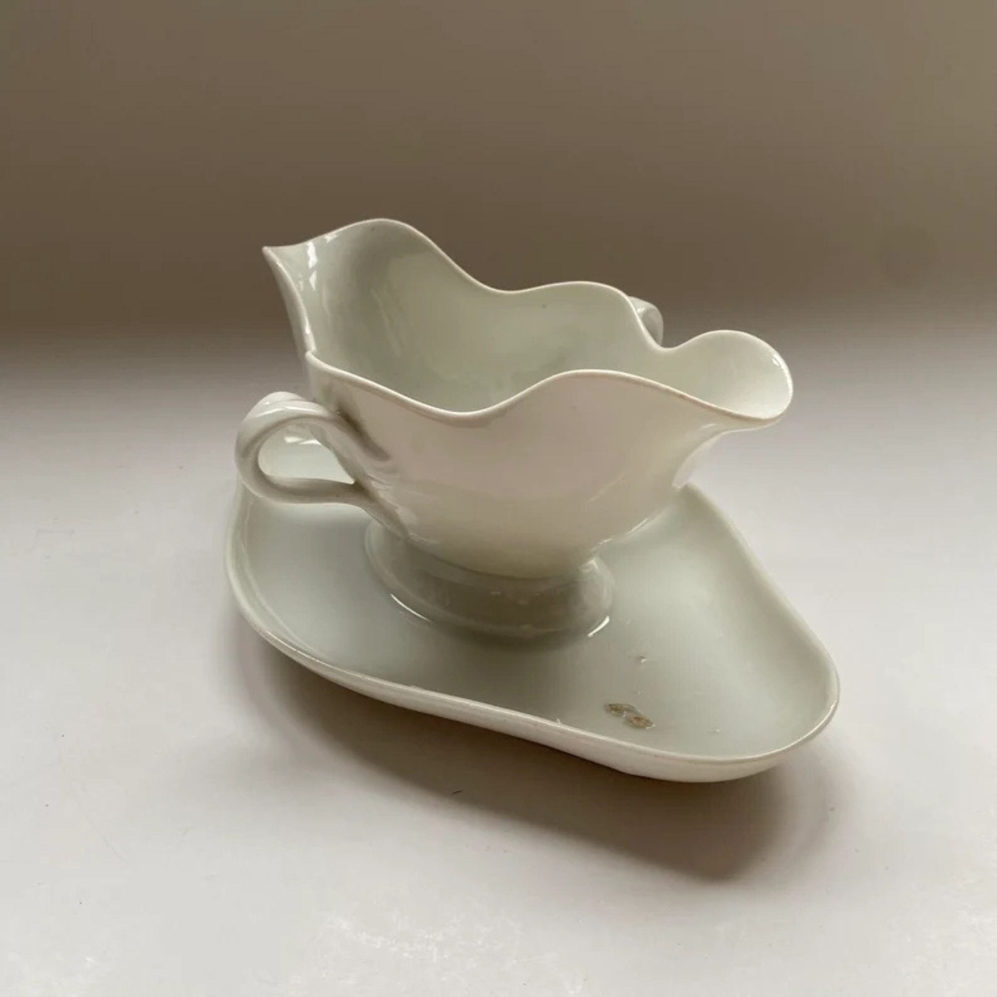 Paris porcelain gravy boat 19th century white
