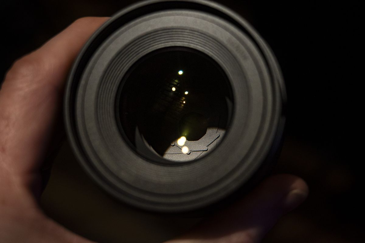 Close up of the front element of the Panasonic Lumix S 100mm F2.8 Macro lens
