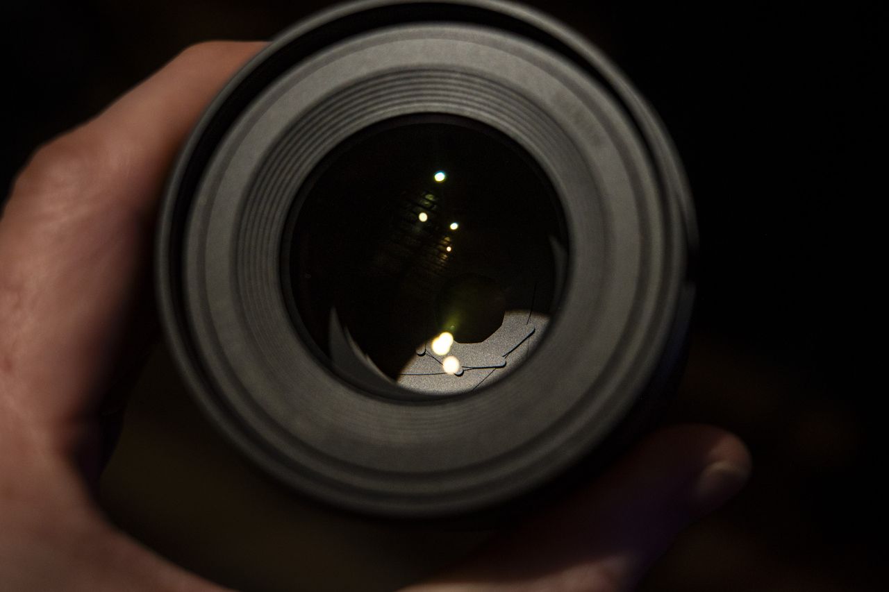 Close up of the front element of the Panasonic Lumix S 100mm F2.8 Macro lens
