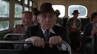 James Whitmore sits by himself afraid on a bus in The Shawshank Redemption.