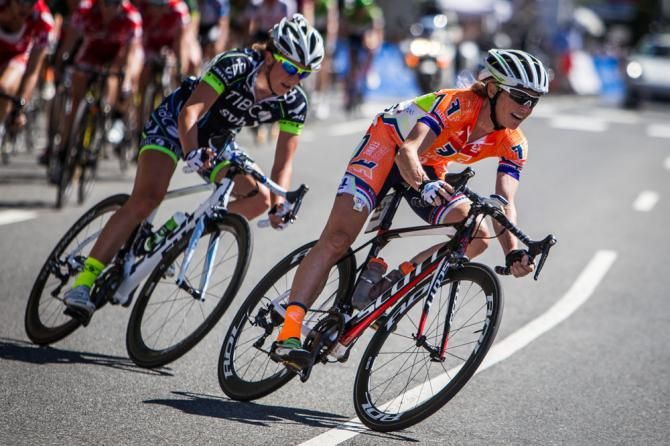 Tina Pic (Fearless Femme) rides in the bunch before taking the win.