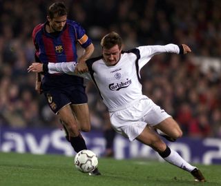 Cocu (left) became a key player for Barcelona