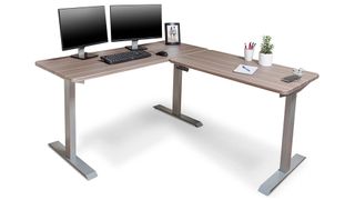 A Brodan Electric Standing L Desk against a white background