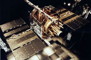 A NAVSTAR GPS satellite undergoing pre-launch testing