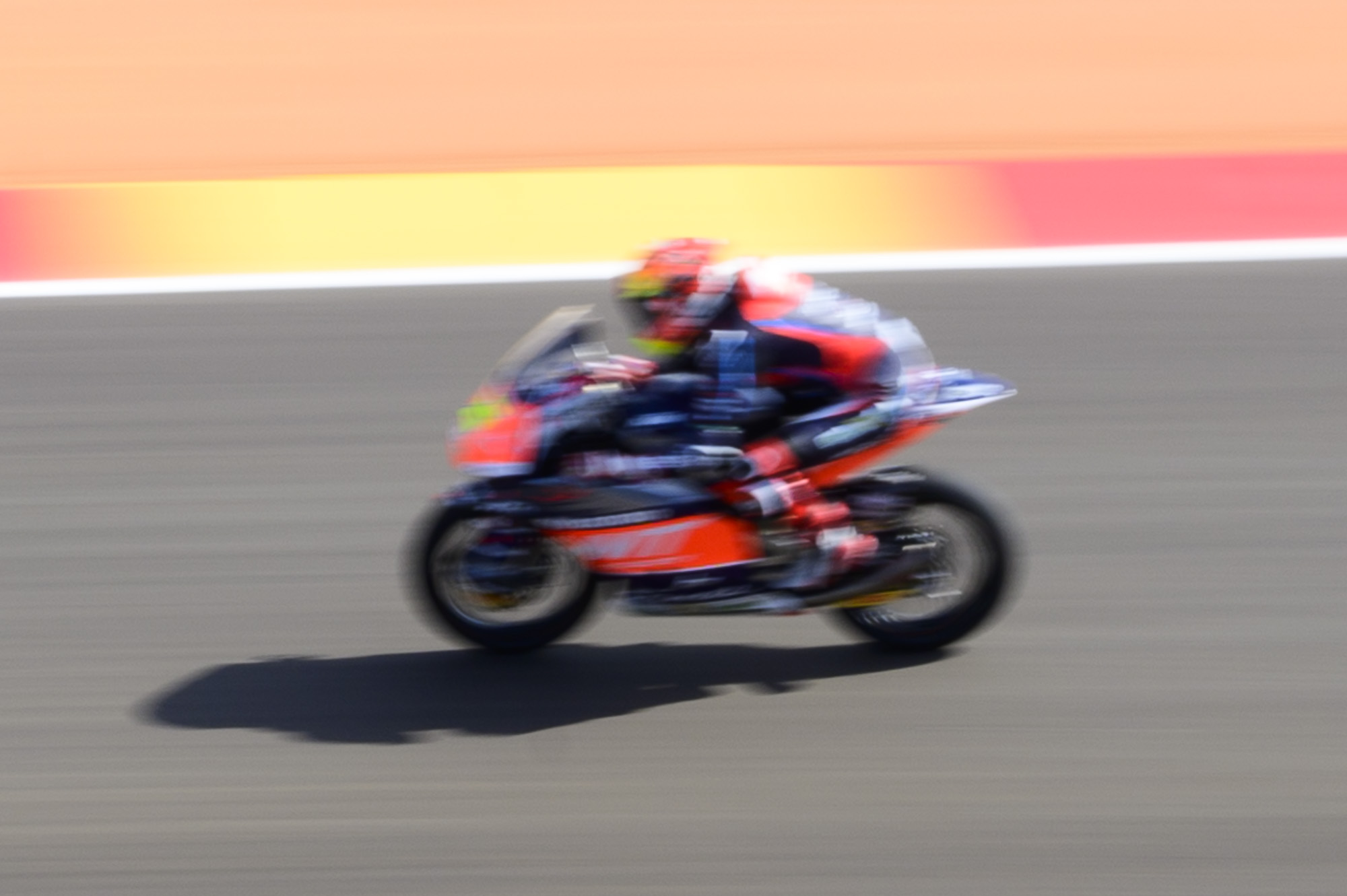 MotoGP racetrack with motorbike riders at full speed