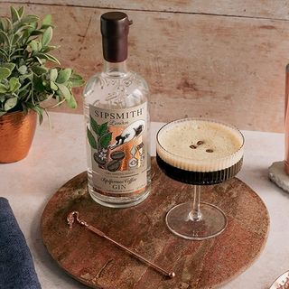 Sipsmith Sipspresso Coffee Gin on a wooden board with a stirrer