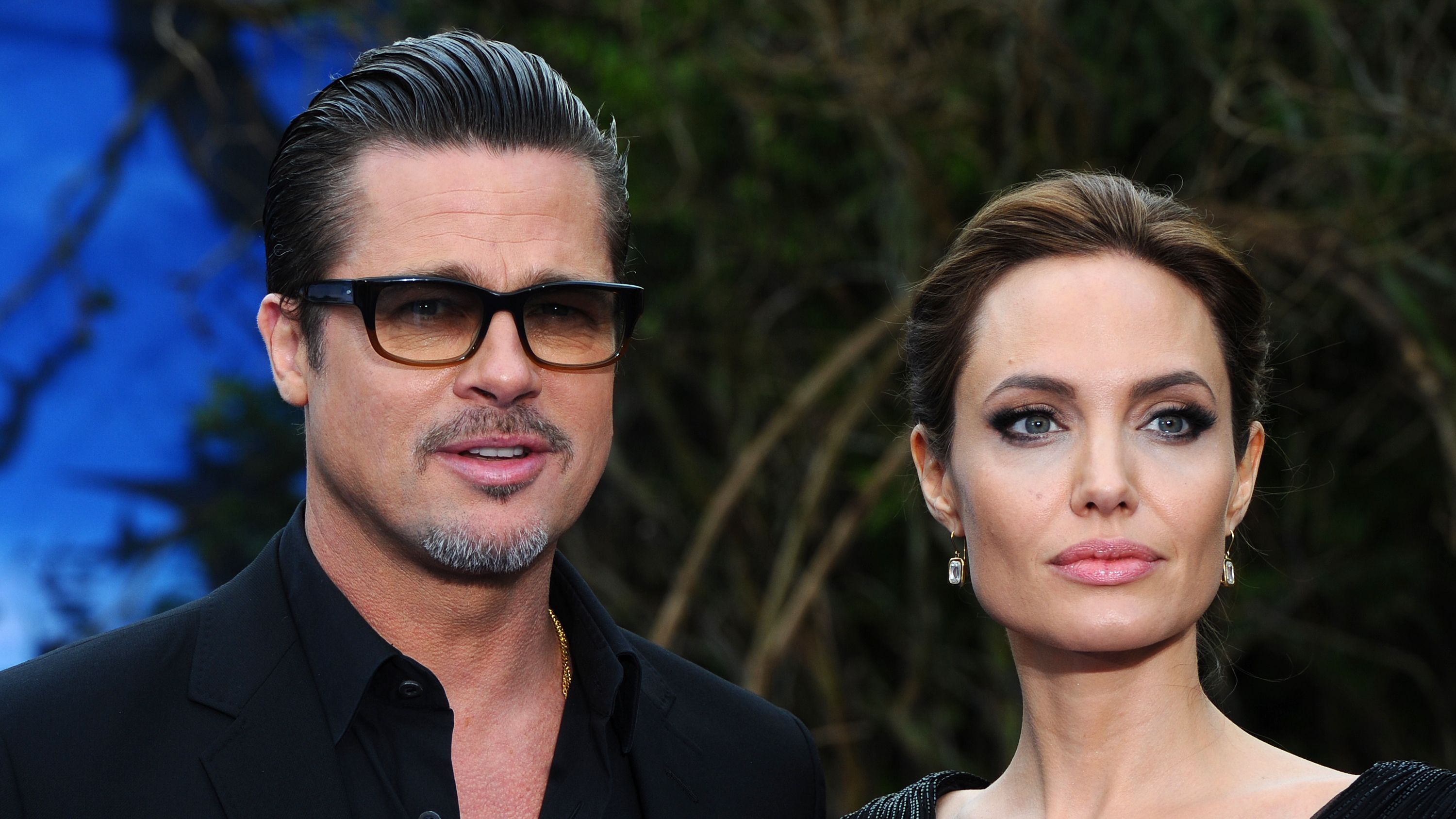 london, england may 08 brad pitt and angelina jolie attend a private reception as costumes and props from disneys maleficent are exhibited in support of great ormond street hospital at kensington palace on may 8, 2014 in london, england photo by anthony harveygetty images