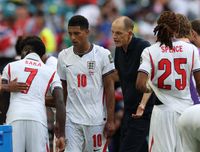 MIAMI GARDENS, FLORIDA - JULY 11: Thomas Tuchel, head coach of England, and Jude Bellingham of England are seen during the FIFA World Cup 2026 Quarter Final match between Norway and England at Miami Stadium on July 11, 2026 in Miami Gardens, Florida. (Photo by Ian MacNicol/Getty Images)