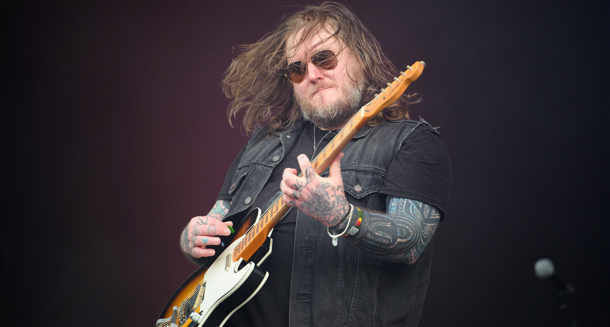 Brian Fallon plays a Fender Telecaster onstage with the Gaslight Anthem.