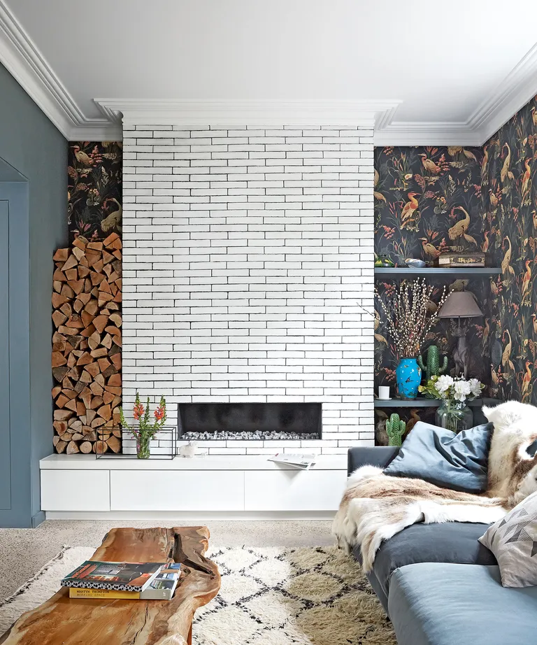 Bohemian living room ideas with brick fireplace and feature wallpaper