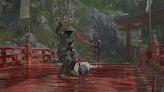 Assassin's Creed Shadows Naoe facing off against samurai warrior on red bridge