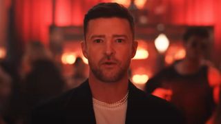 Justin Timberlake singing in a bar in the No Angels music video.