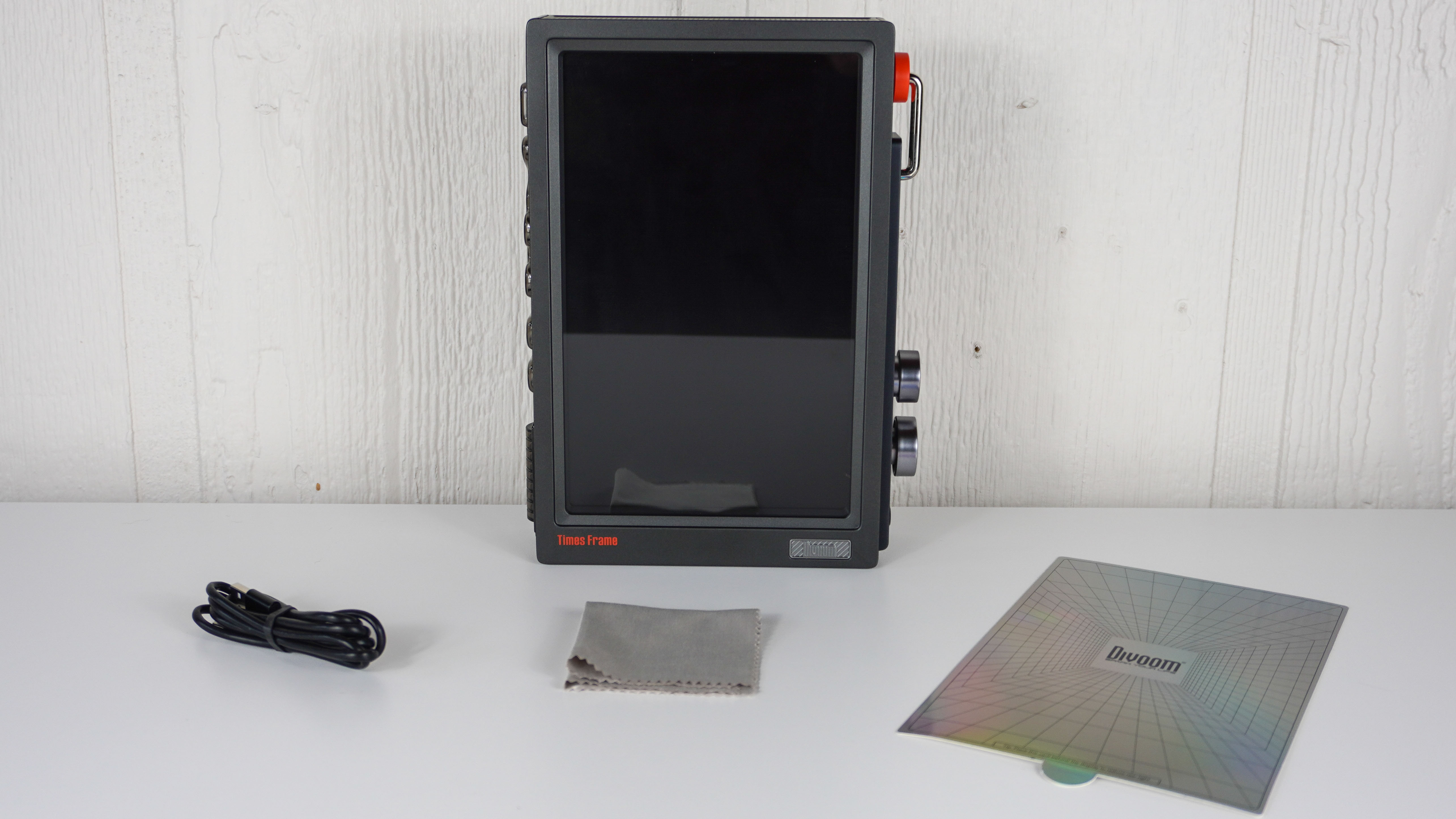 The Divoom Times Frame unboxed on a table