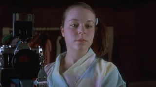 Tina Majorino as Deb taking a photo with her camera in Napoleon Dynamite