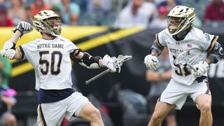 Chris Kavanagh #50 of the Notre Dame Fighting Irish celebrates his goal along with Pat Kavanagh