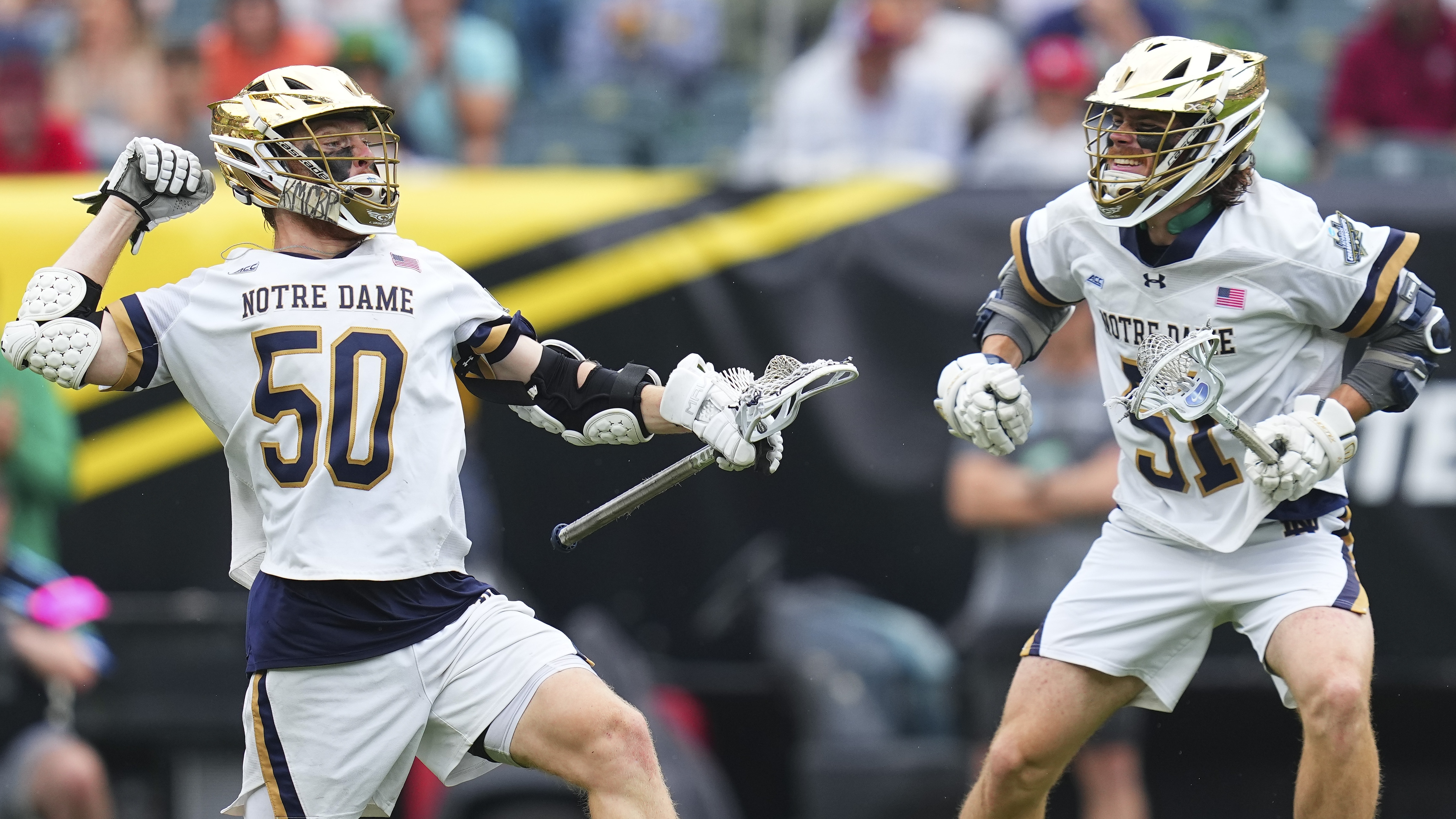 Chris Kavanagh #50 of the Notre Dame Fighting Irish celebrates his goal along with Pat Kavanagh 