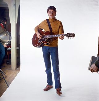 Robbie Robertson of the roots rock group The Band poses for a portrait in 1969 in Saugerties, New York.