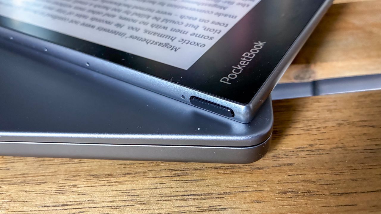 The power button on the top left corner of the PocketBook InkPad Eo