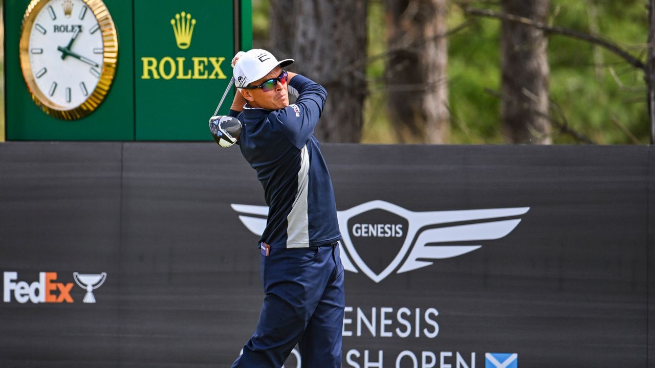 Rickie Fowler plays his shot from the 18th tee during the third round of the Genesis Scottish Open.