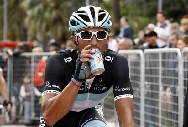 Daniele Bennati (Leopard Trek) grabs a drink after his 13th place finish.