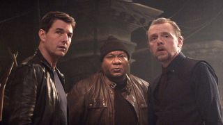Tom Cruise, Ving Rhames, and Simon Pegg cryptically looking in the same direction in Mission: Impossible - Dead Reckoning Part One.