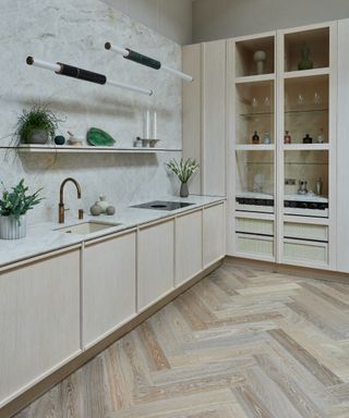 light wood kitchen with parquet flooring