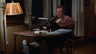 Misery James Caan as Paul Sheldon at typewriter