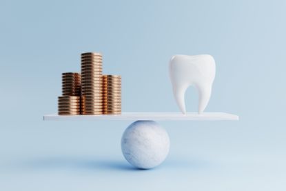 Dental tooth and golden coin on balancing scale