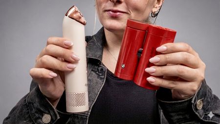 Dyson HushJet Mini Cool vs. Shark ChillPill both in hand side-by-side comparsion