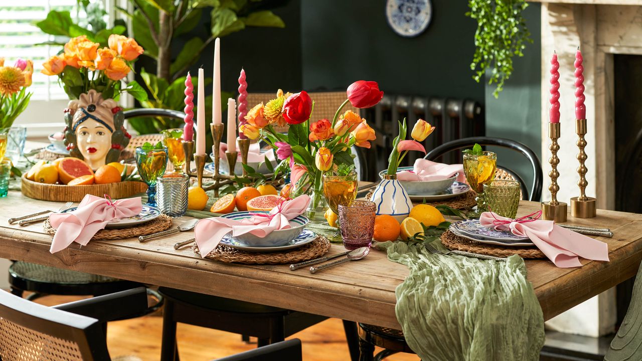 Dining room tablescape with Italian themed decor and flowers.