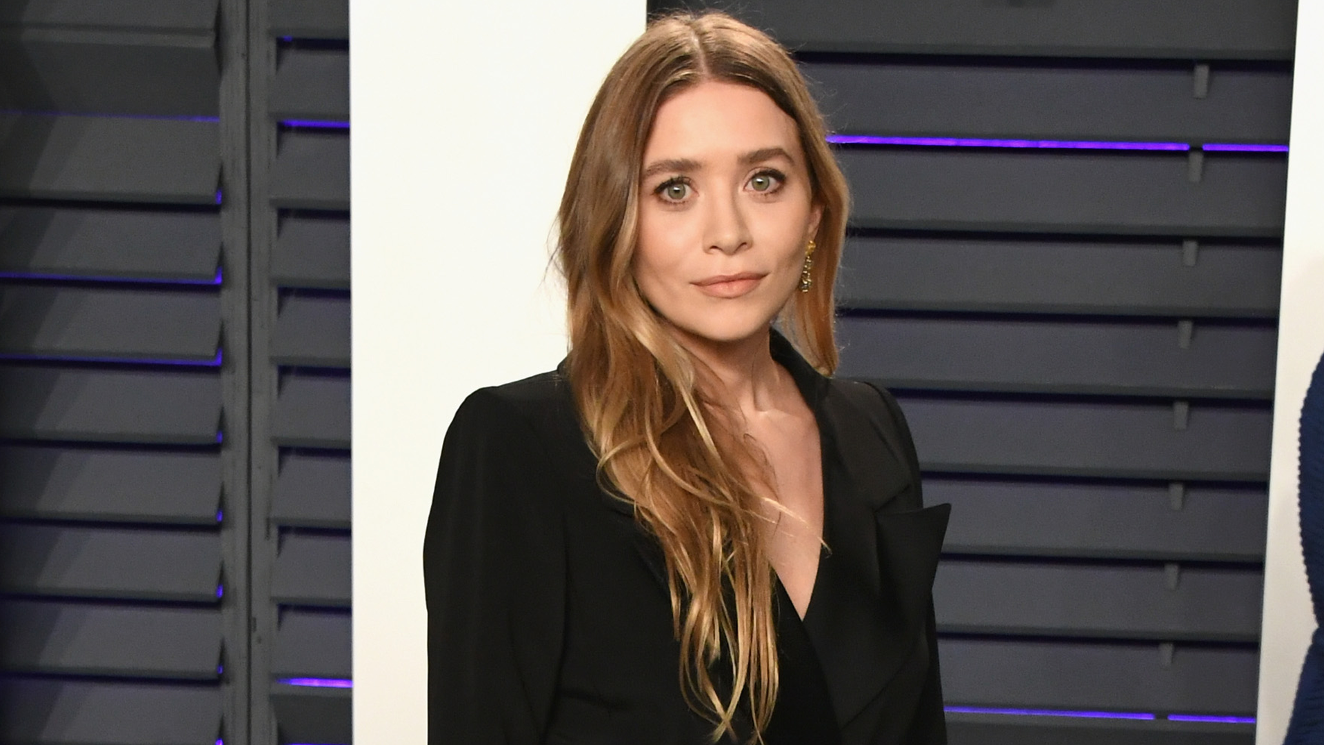 Ashley Olsen attended the YES Scholars 25th Anniversary Gala in a floor-length trench coat dress