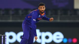 Varun Chakravarthy of India in bowling action ahead of the India vs Bangladesh and live stream 2nd T20 2024