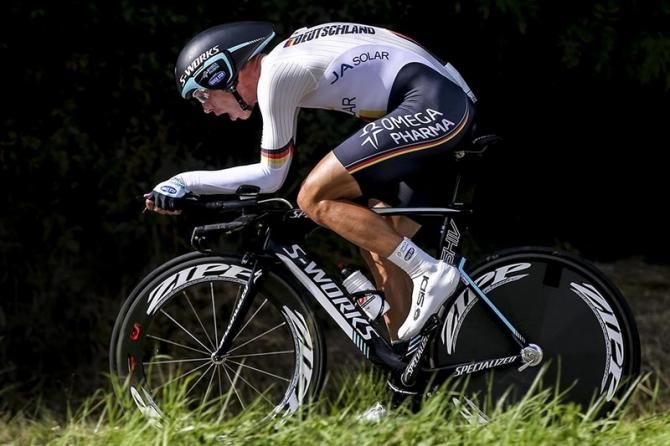 Tony Martin (Germany) powers to victory in the Worlds TT.