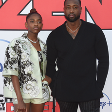 Zaya Wade and father Dwyane Wade at the 'Cheaper By The Dozen' premiere held at El Capitan Theatre on March 16th, 2022 in Los Angeles, California.