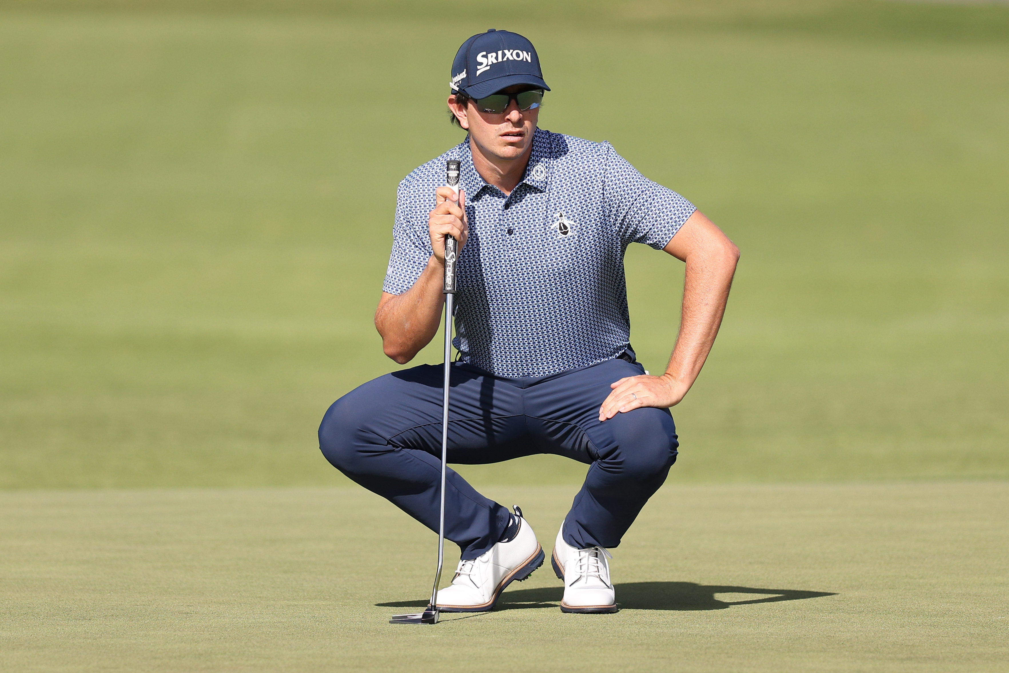 Nico Echavarria lines up a putt