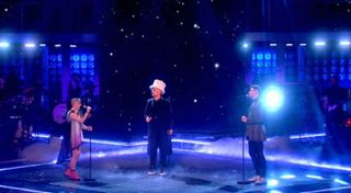 Cody also sang with her coach Boy George and teammate Vangelis, performing a Culture Club classic, Victims.