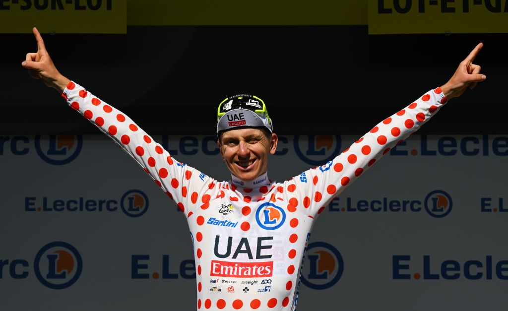 VILLENEUVESURLOT FRANCE JULY 11 Tadej Pogacar of Slovenia and UAE Team Emirates celebrates at podium as Polka Dot Mountain Jersey winner during the 111th Tour de France 2024 Stage 12 a 2036km stage from Aurillac to VilleneuvesurLot UCIWT on July 11 2024 in VilleneuvesurLot France Photo by Tim de WaeleGetty Images