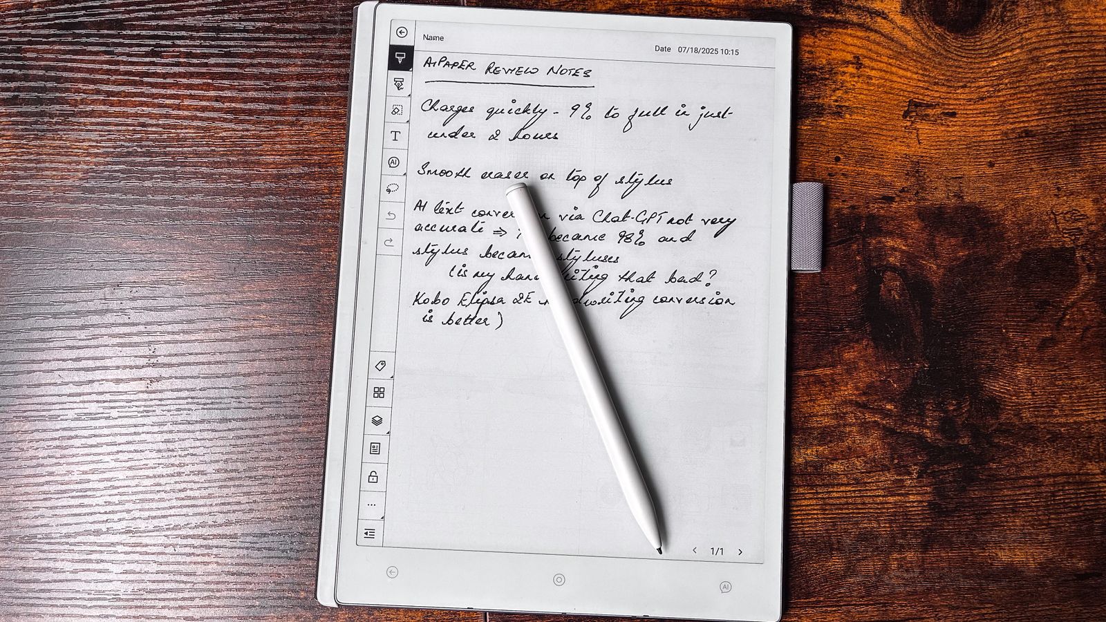 The ViWoods AiPaper stylus lying on top of the screen with notes on the device written down