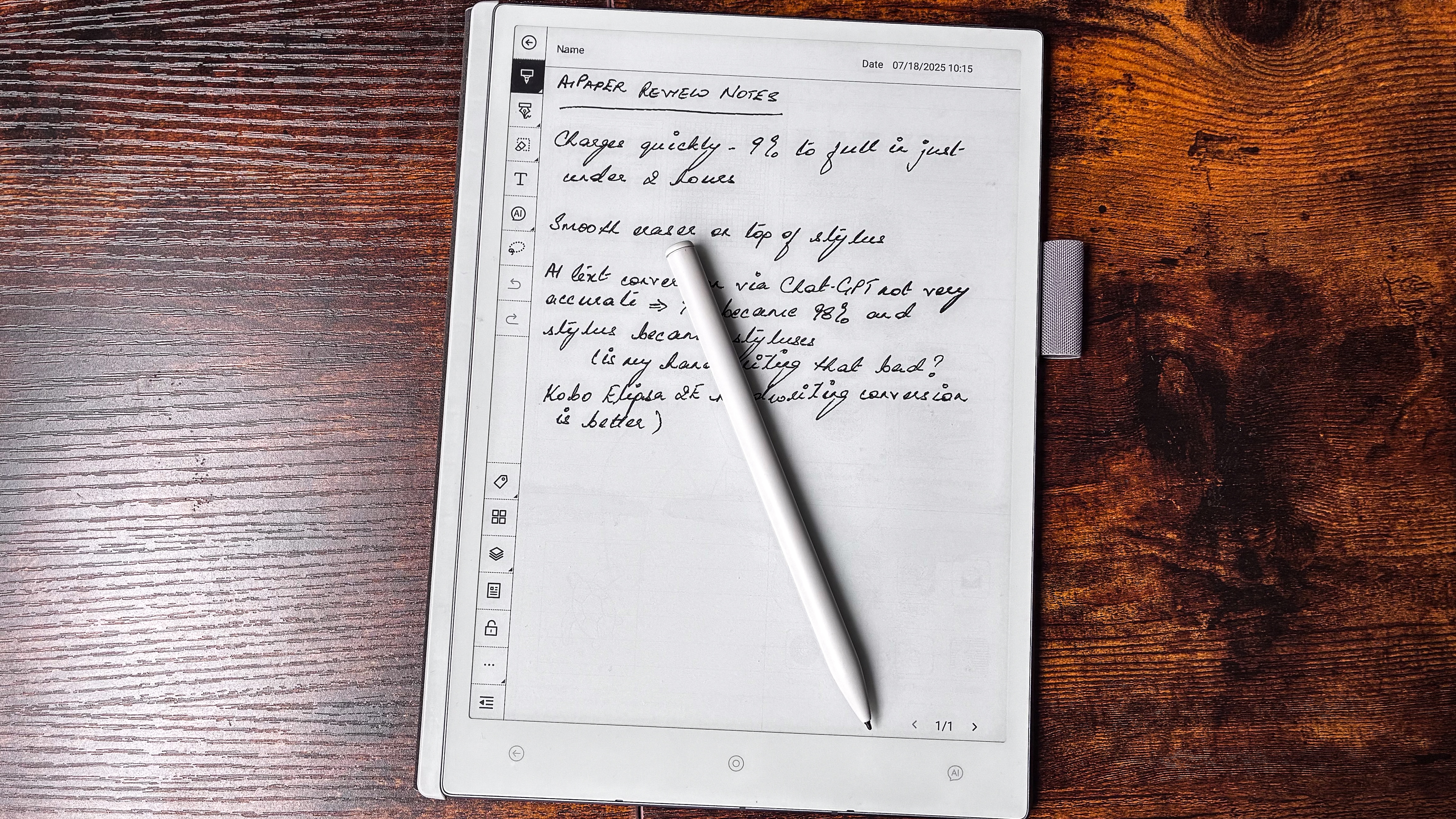 The ViWoods AiPaper stylus lying on top of the screen with notes on the device written down