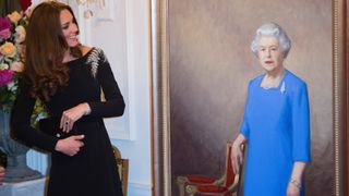 Kate Middleton near a portrait of Queen Elizabeth II